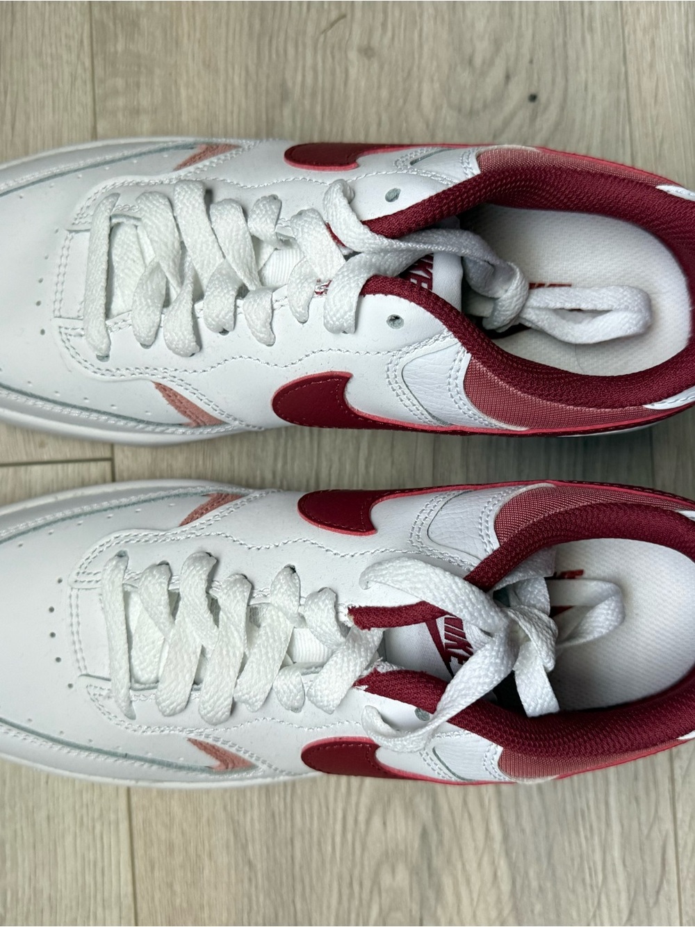 Nike White Sneakers with Red Accents
